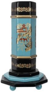 Tall decorative Chinese-inspired lantern with teal central panel, black and gold trim, and a tiered base on a small pedestal.