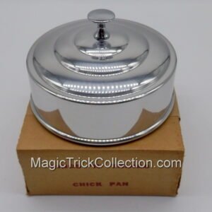 Rings-N-Things Chick Pan is a highly collectible, vintage piece of magic apparatus used by magicians to seamlessly vanish or produce small objects.